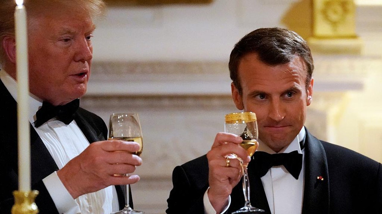 Trump hosts Macron at gala dinner and hints at new Iran deal