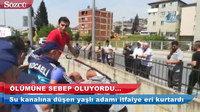 Su kanalına düşen yaşlı adamı itfaiye eri sırtına alarak kurtardı