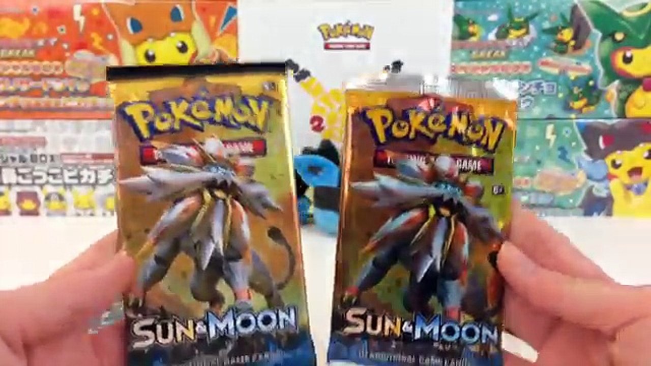 REAL VS FAKE POKEMON SUN AND MOON BOOSTER PACKS OPENING!!