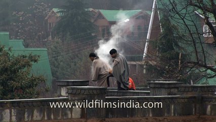 Kashmiri man goes up in smoke! Warming up with a kangri