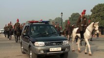 After Indian Army horses pass,  the poo collectors get going!