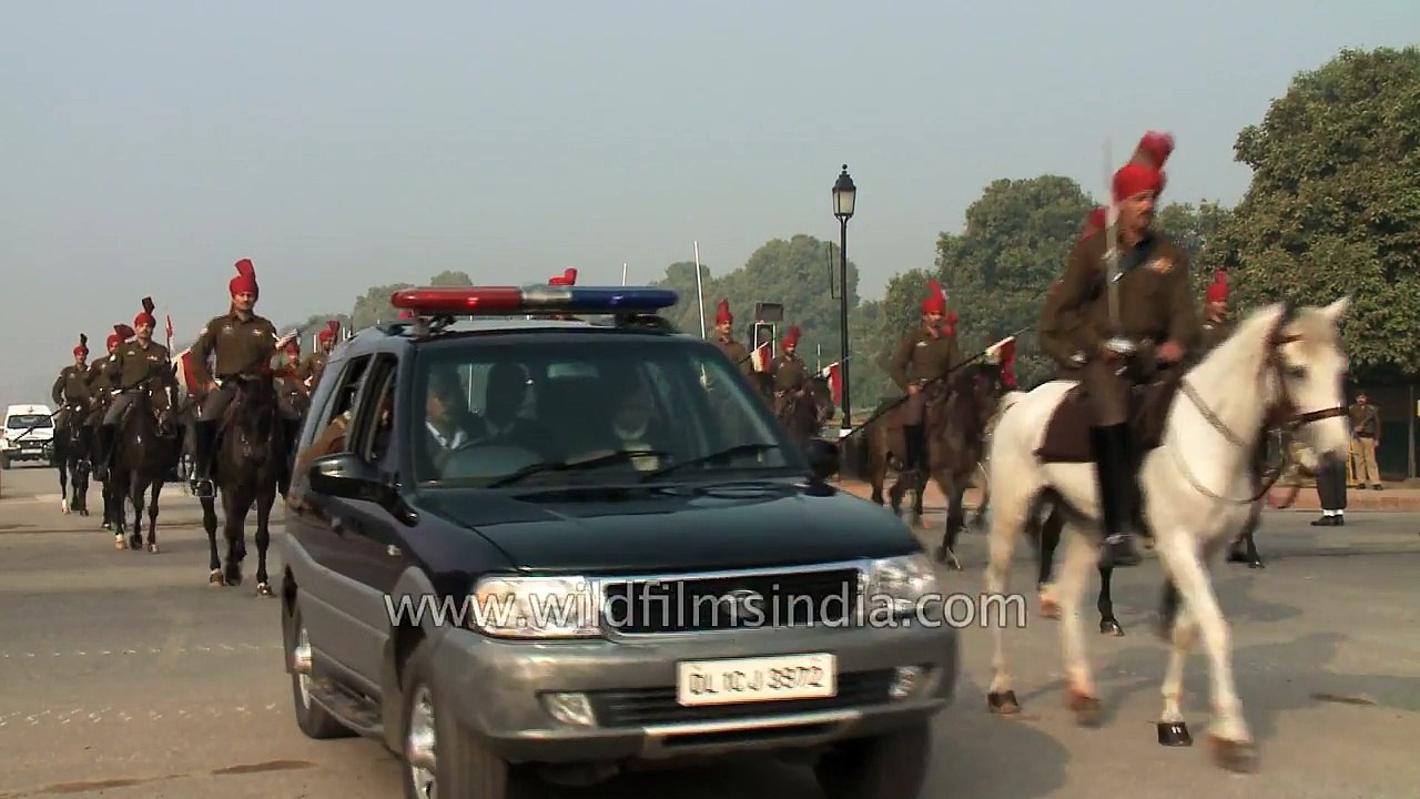 After Indian Army horses pass,  the poo collectors get going!