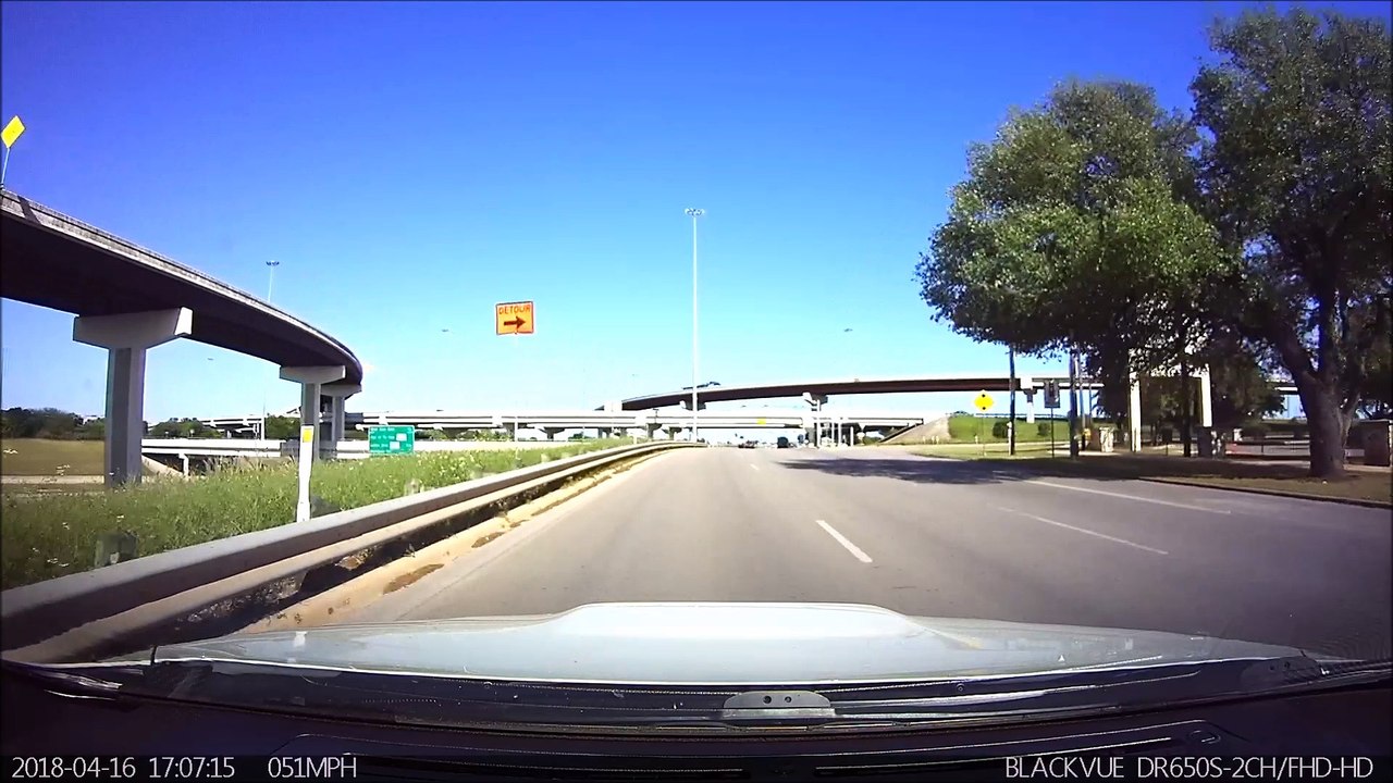 Cop Runs Red Light and Nearly Runs into Car