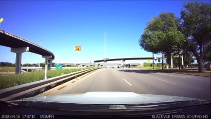 Cop Runs Red Light and Nearly Runs into Car
