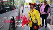 Fan Shuhui, 55, serves as a public civility guide in Beijing for ten years. Working at a bus stop with various scenic spots nearby, Fan usually spends 5 to 6 ho