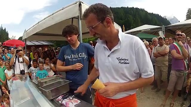 Most ice cream scoops balanced on a cone Guinness World Record By Dimitri Panciera
