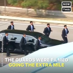 Kim Jong-Un’s security guards run in formation around his limo