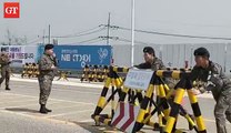 South Korean soldiers removed barricades from the Unification Bridge on Thursday. The Unification Bridge is 9.5 kilometers away from the truce village, Panmunjo