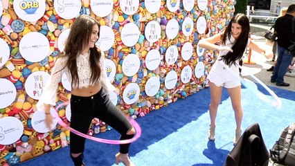 Two Gorgeous Female Reporters Hula Hoop Battle