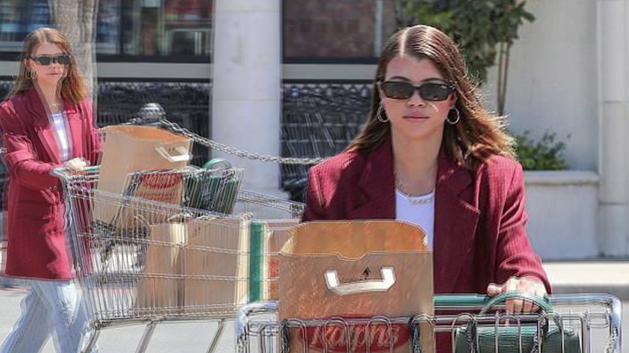 Sofia Richie sports an oversized red blazer and jeans on a grocery run in Los Angeles.