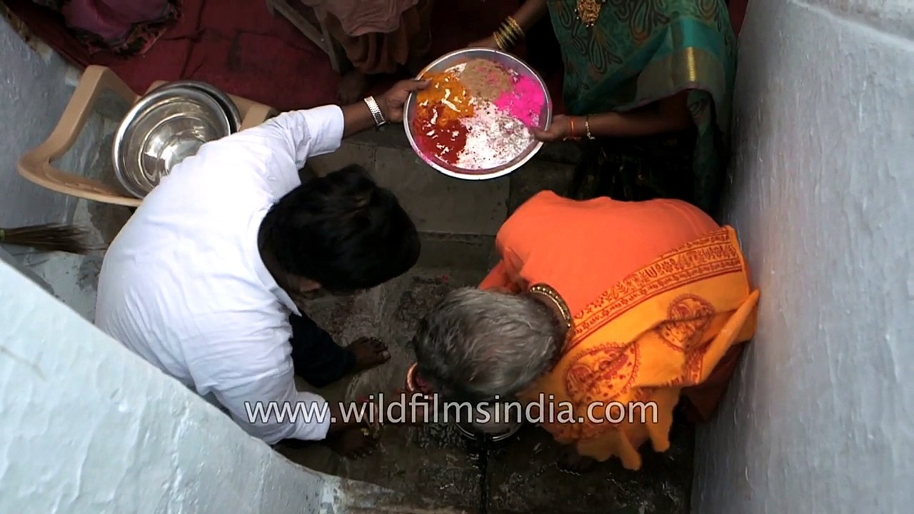 Harinath Goud performing holy rituals at sacred well - Hyderabad