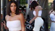 Kim Kardashian pulls up her strapless tube top in Los Angeles as she continues brutal 10-day cleanse.