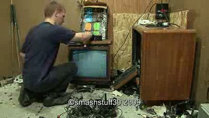 angry gamer smashing Atari video computer system