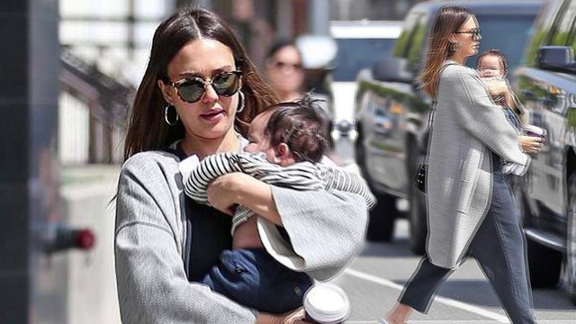 Jessica Alba enjoys snuggles with her baby boy on sunshine stroll in Los Angeles.