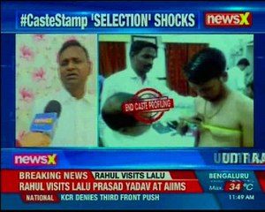 Caste stamp cappearing for exam marked 'SC, ST' on their chests