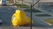 Inflatable Duck Drifts Aimlessly Down Street in Des Moines