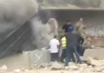 Good Samaritans Help Free Trapped Motorist in Los Angeles