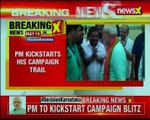 PM Modi lands in Chamarajanagar, Mysuru; kickstarts his campaign trail