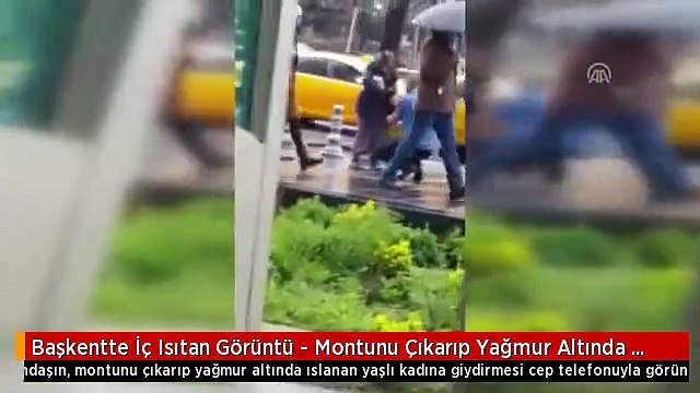 yağmurda ıslanan yaşlı kadına montunu veren adam