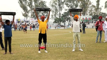 Tyre lifting competition in Kila Raipur Sports Festival! Ludhiana