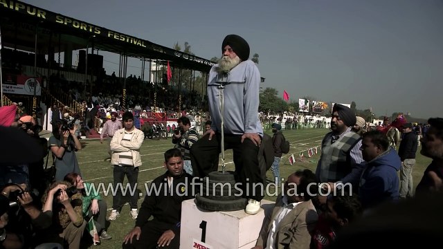 Old Sikh man lifts 85 kg weight with beard
