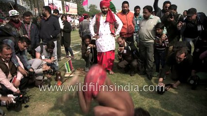 Handstand on bricks by physically challenged Indian