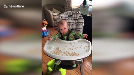 Deaf baby communicates with parents in sign language