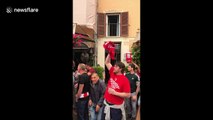 Liverpool fans sing in Rome bar before Champions League semi-final