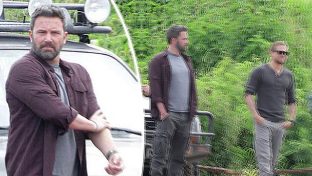 Ben Affleck rolls up his sleeves as he films Triple Frontier with Charlie Hunnam in Hawaii.