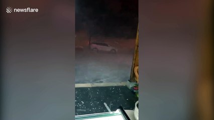 Violent hailstorm leaves streets in China thick with ice