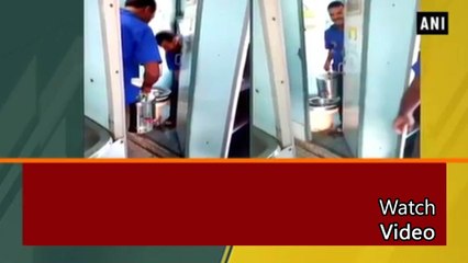 Download Video: Hyderabad Railway vendor brings out tea cans from inside train toilet