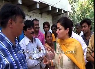 Indian politician Poonam falls into drain as slab collapses