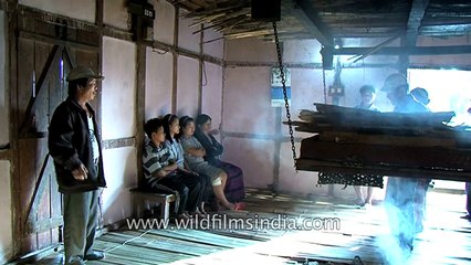 Shaman conducts Amraseh puja using chicks, in India