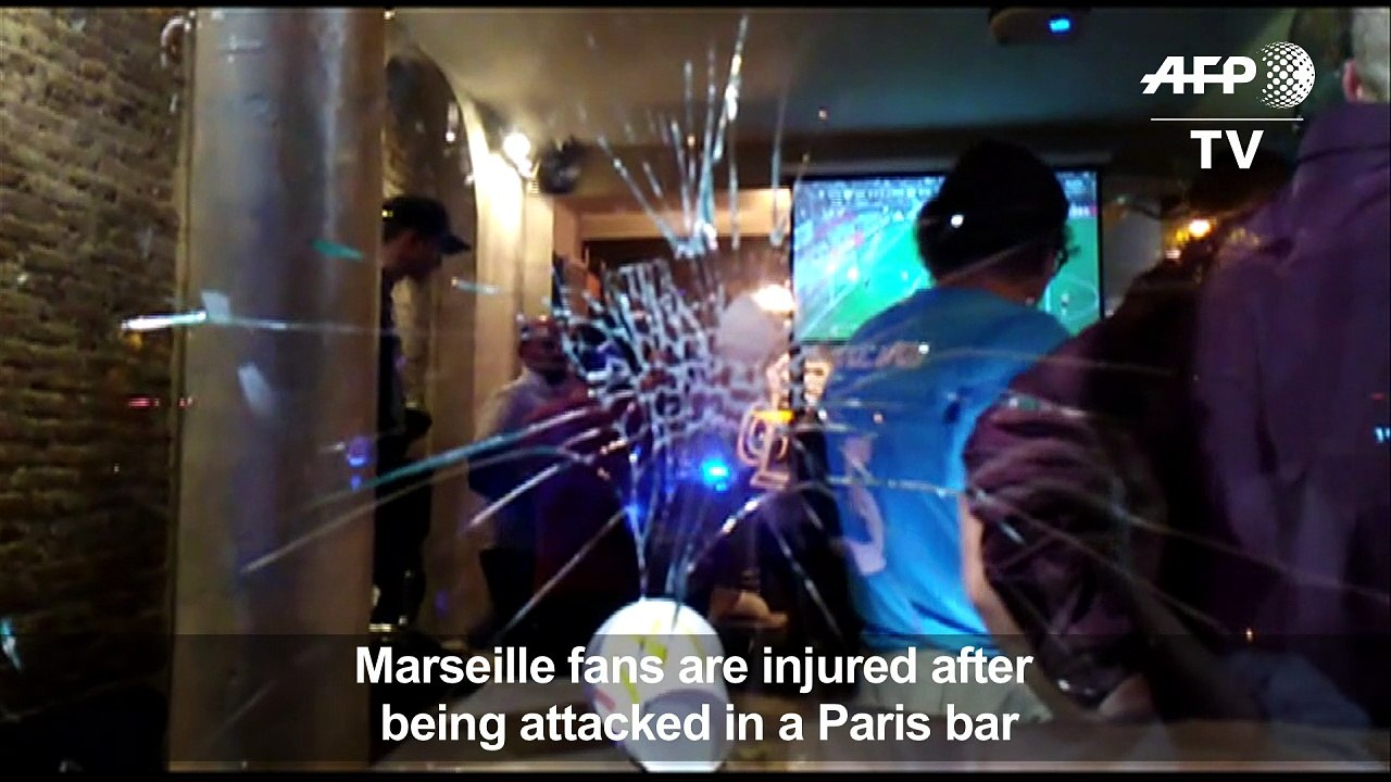 French football supporters attacked in Paris bar
