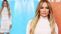 Jennifer Lopez hints that she IS 'open' to marrying for a fourth time... as she opts for bridal-white dress at NBCUniversal event.