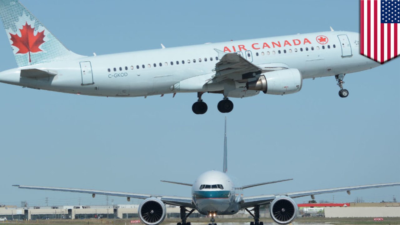 Close call as plane nearly lands on taxiing planes - TomoNews