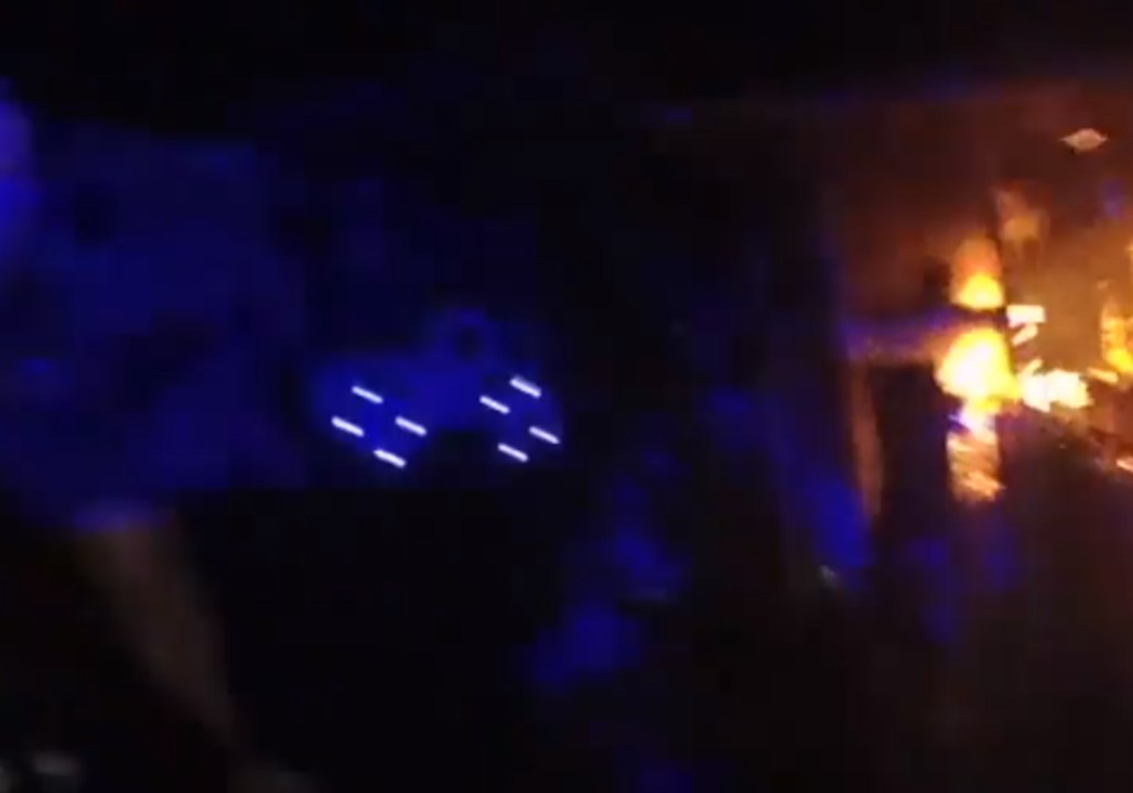 Ohio Police Officers Rescue Woman Trapped in Burning Home