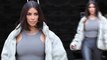Kim Kardashian reveals her figure in skintight outfit as she defends Kanye West on Twitter