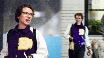 Scarlett Johansson sports purple coat for casual date night with her daughter and beau Colin Jost.