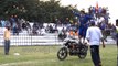 Sikh rides motorcycle standing atop it, with swords - see ma, no hands!