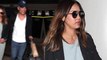 Jessica Alba and husband Cash Warren hold hands while arriving home from her birthday trip to Mexico.