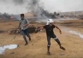 Gaza Protesters Use Tennis Rackets to Bat Away Israeli Gas Canisters