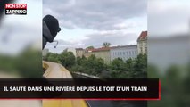 Inconscient, il saute dans une rivière depuis le toit d'un train en marche  (vidéo)