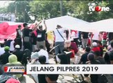 Aksi Relawan Jokowi dan Ganti Presiden di Silang Monas