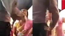 Indonesian cop smacks niece over clothing