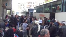 نقل مقاتلي المعارضة والمدنيين الراغبين بالخروج من ريف حمص