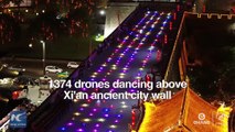 New record! 1,374 drones dance over ancient city wall of Xi'an