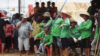 World's strangest funeral: Thai villagers fire rockets at pyre to honour late monk