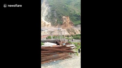 Eyewitnesses scream in panic as huge landslide rocks southern China