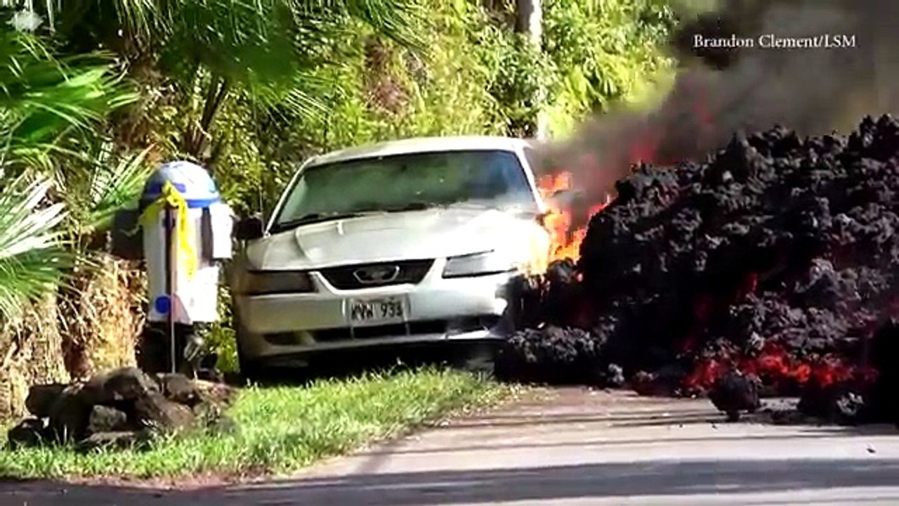 Lava from Kilauea volcano consumes a car in Hawaii